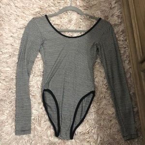 Gray and black striped longsleeve bodysuit
